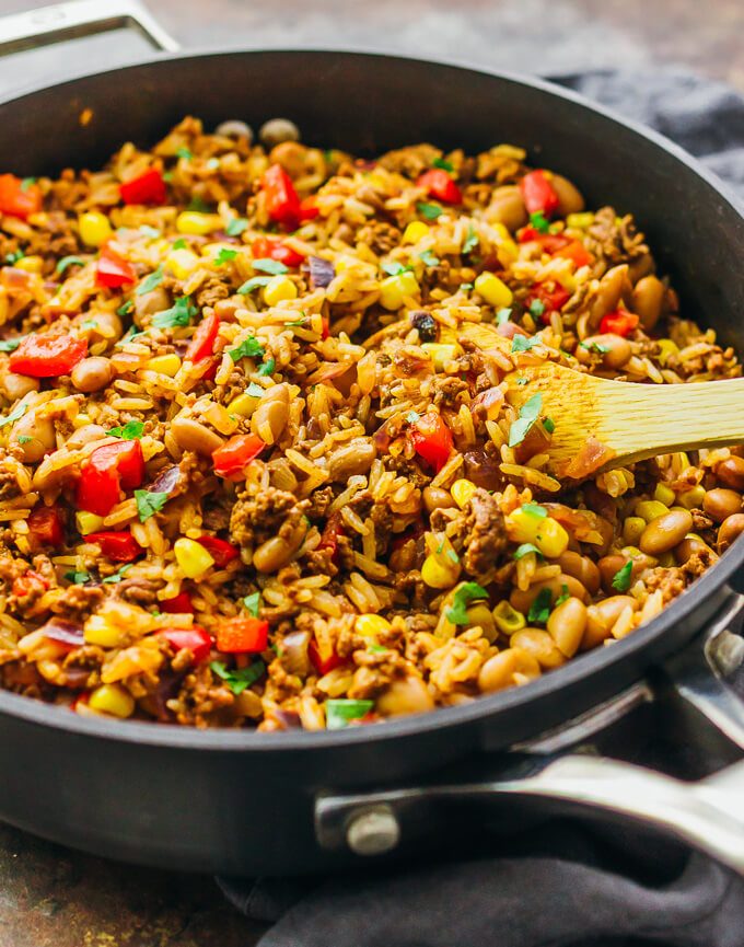This tasty Southwest skillet has ground beef, rice, peppers, onions, pinto beans, corn, and a dash of cayenne -- all cooked together in one pan.