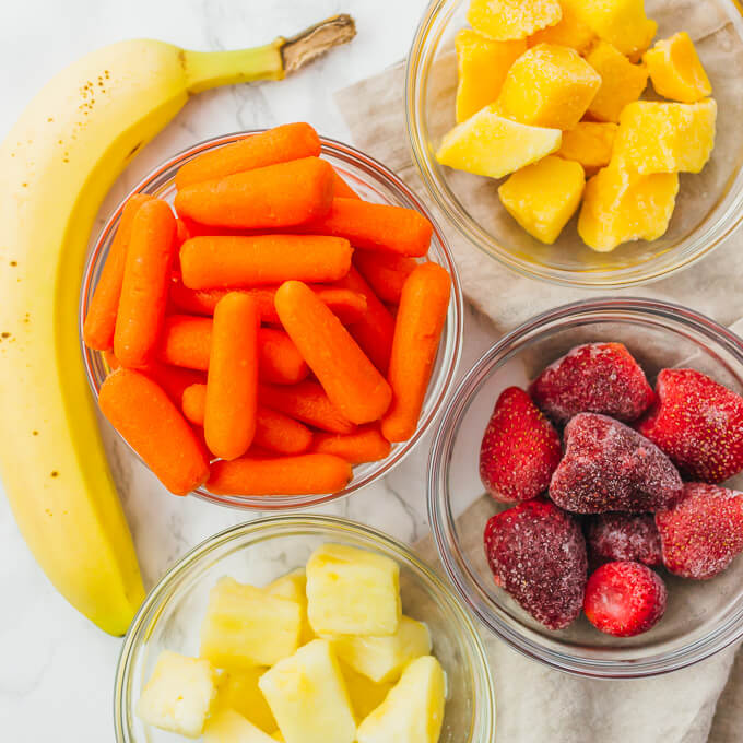 carrot smoothie ingredients in prep bowls