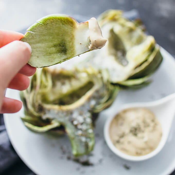 artichoke leaf dipped in sauce