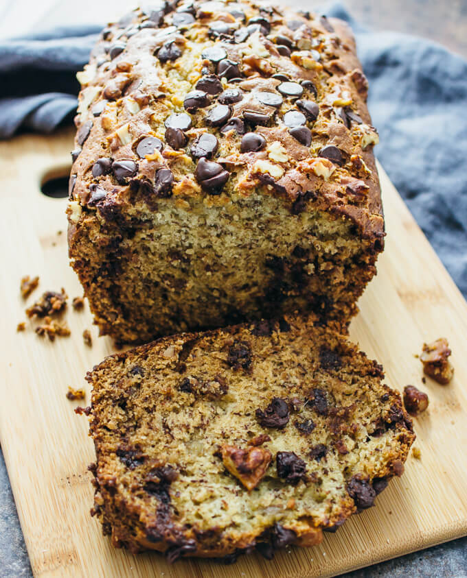 slicing through banana bread loaf