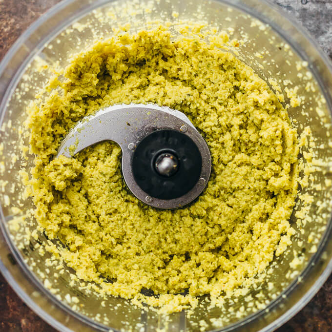 Roasted curry cauliflower dip all pureed in a food processor bowl