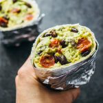 Guacamole burrito with balsamic roasted tomatoes and black beans
