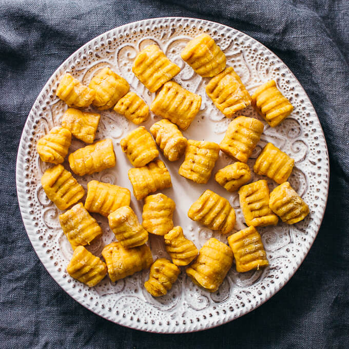 gnocchi pieces on a white plate