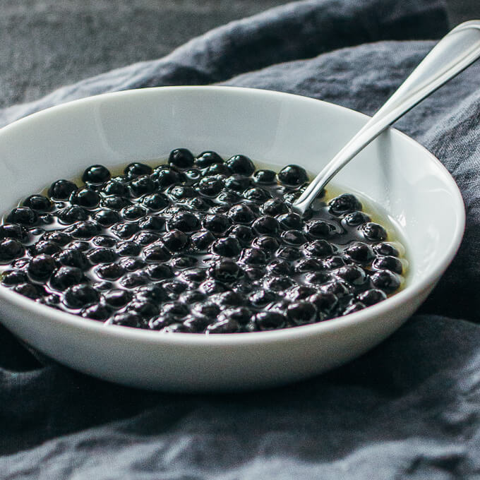 stirring tapioca pearls with honey