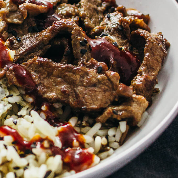 close up view of beef in bibimbap bowl