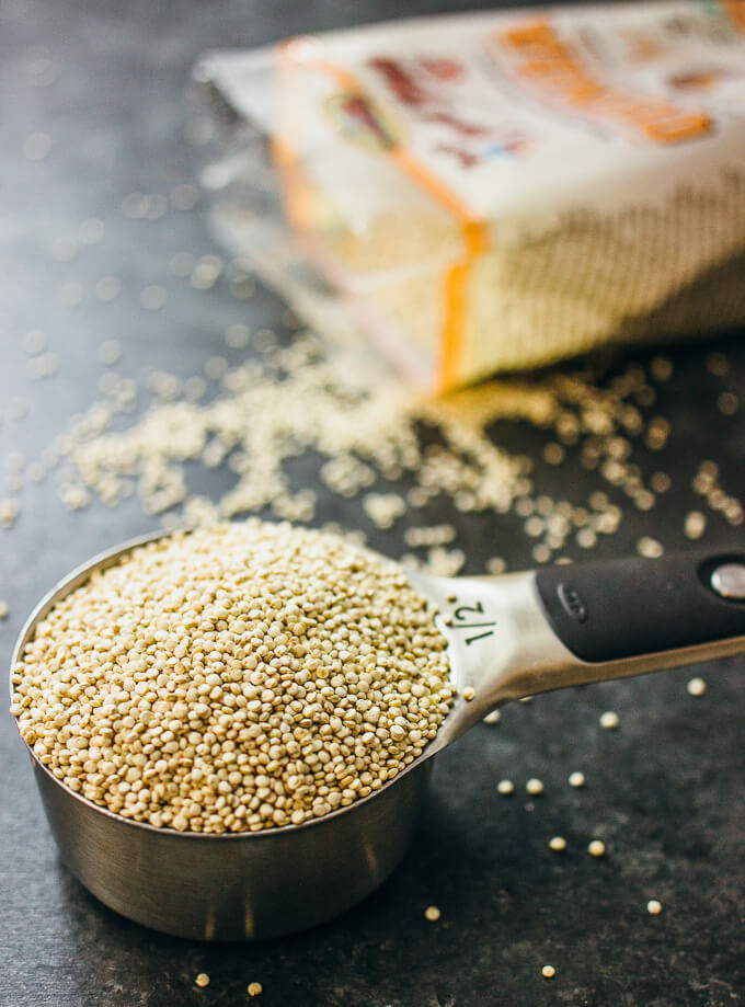 uncooked quinoa in a measuring cup