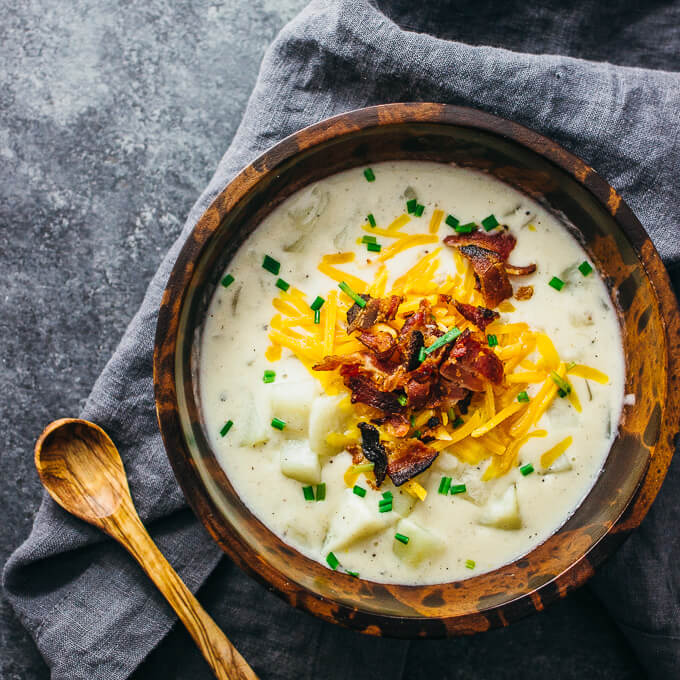 potato soup served in wooden bowl