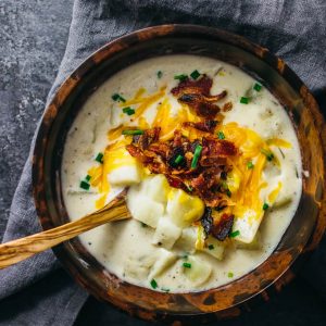 overhead view of creamy potato soup with bacon