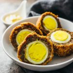 Scotch eggs with curry mustard sauce