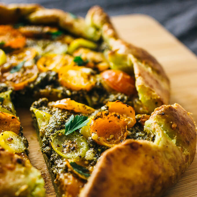 Savory galette with pesto and heirloom tomatoes