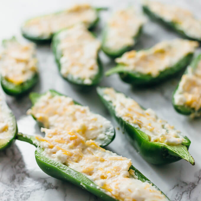 stuffing jalapenos with cream cheese and cheddar