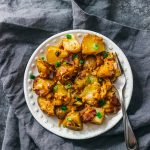 Cajun slow cooker potatoes with bacon and cheddar cheese