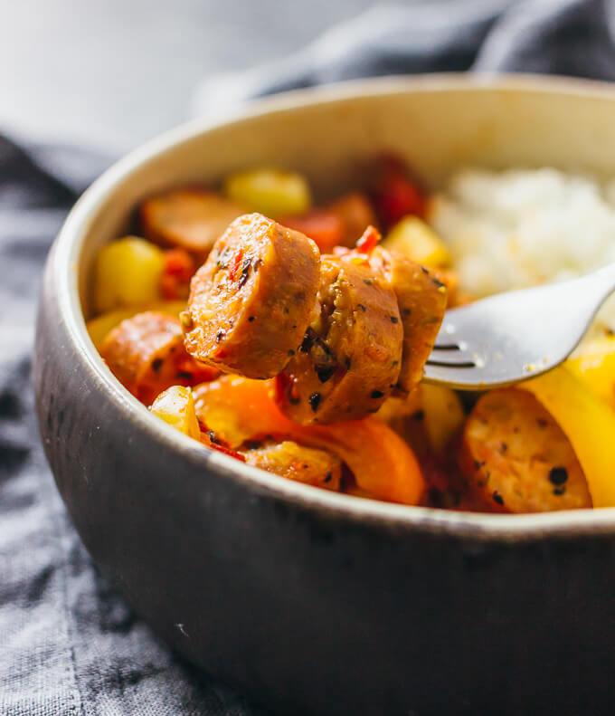 close up view of sausage on a fork