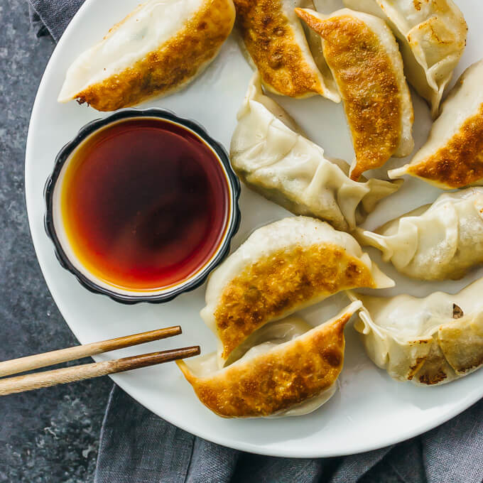 pan fried chinese dumplings with dipping sauce