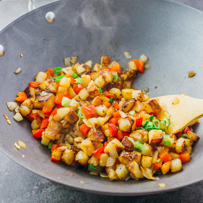 These crispy skillet breakfast potatoes aka diner-style “home fries” are addicting — they are pan-fried with onions and peppers, and tossed with lemon juice.