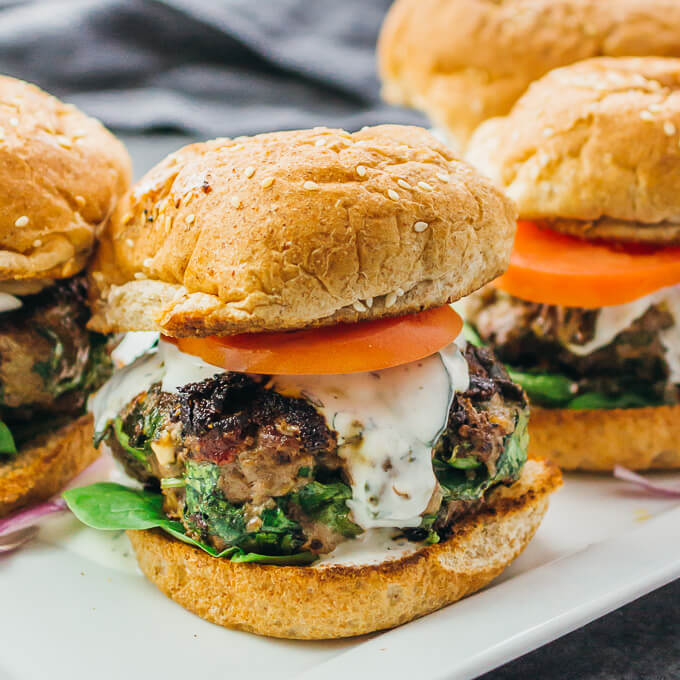 greek burgers with ground beef, spinach, feta, and sun-dried tomatoes