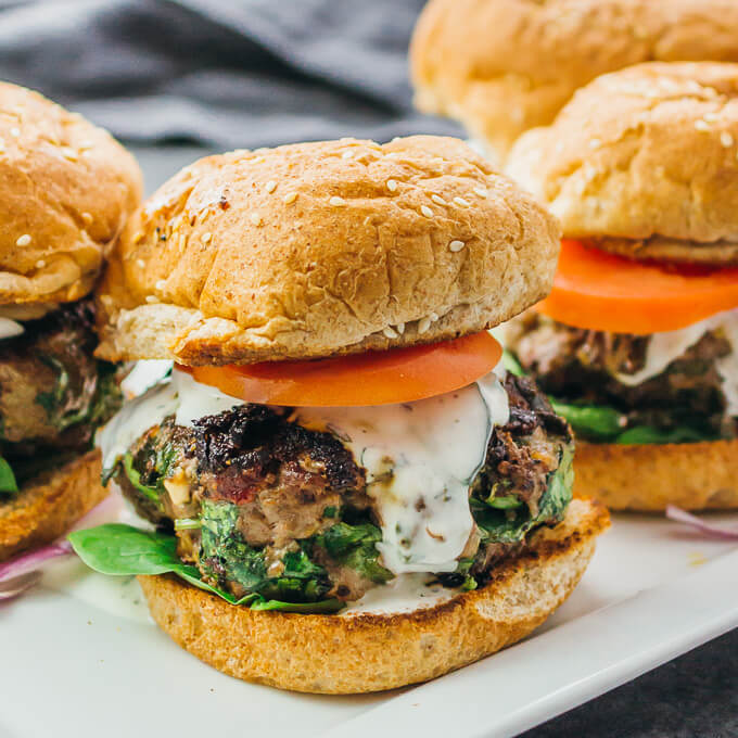 Greek Burgers with Spinach, Feta, and Sun-Dried Tomatoes - Savory Tooth