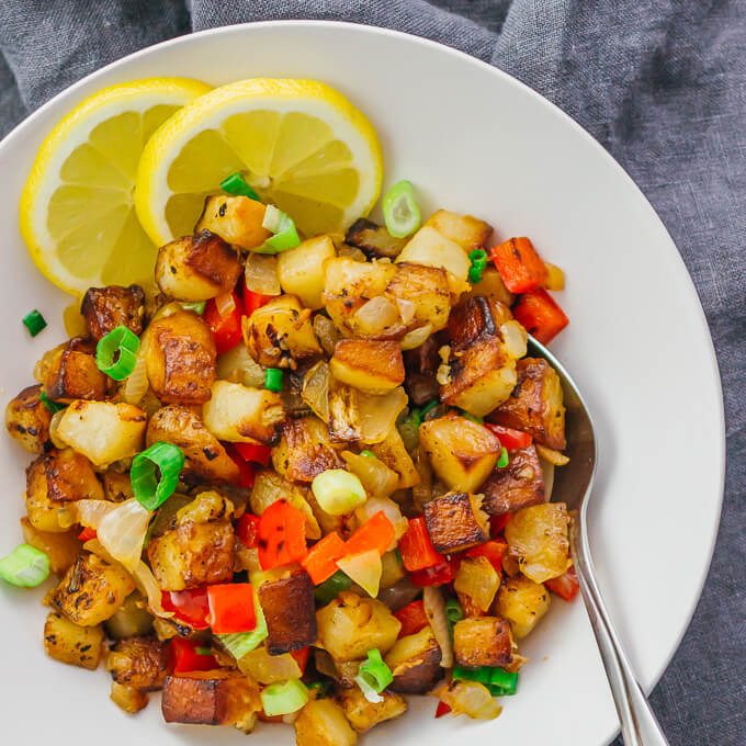 These skillet breakfast potatoes or diner-style "home fries" are addicting -- crispy fried with onions and peppers, and tossed with lemon juice. 