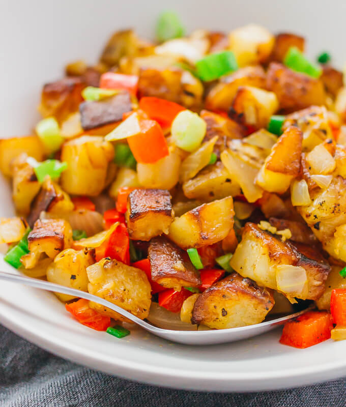 These skillet breakfast potatoes or diner-style "home fries" are addicting -- crispy fried with onions and peppers, and tossed with lemon juice. 