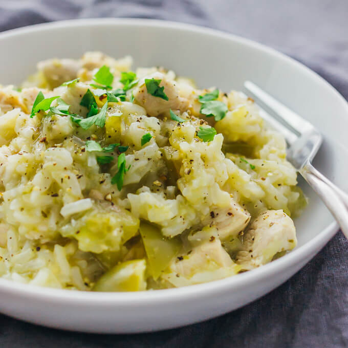 salsa verde chicken and rice served in white bowl