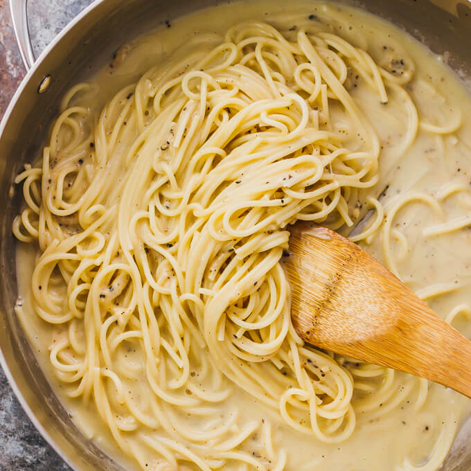 Cacio e pepe is one of the simplest pasta dishes -- spaghetti with melted parmesan cheese and black pepper.