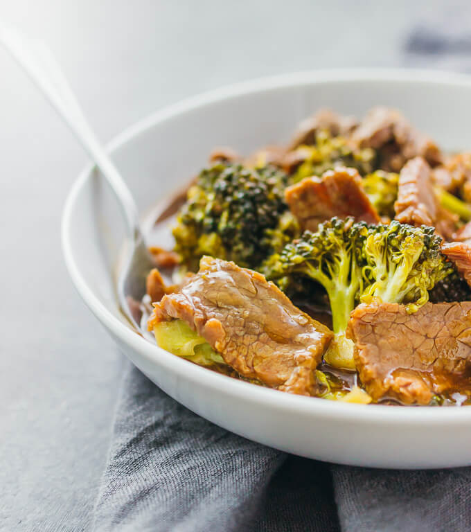 close up view of beef and broccoli in a bowl