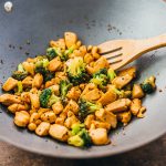 cooking cashew chicken stir fry in wok