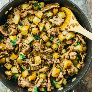 This skillet meal is an easy dinner with thinly sliced steak, cubed potatoes, and onions.