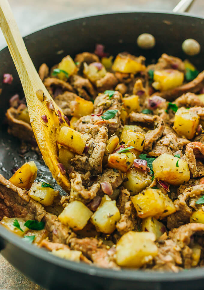 This skillet meal is an easy dinner with thinly sliced steak, cubed potatoes, and onions.