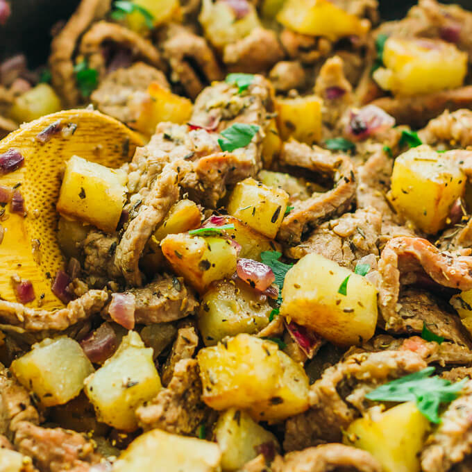 This skillet meal is an easy dinner with thinly sliced steak, cubed potatoes, and onions.
