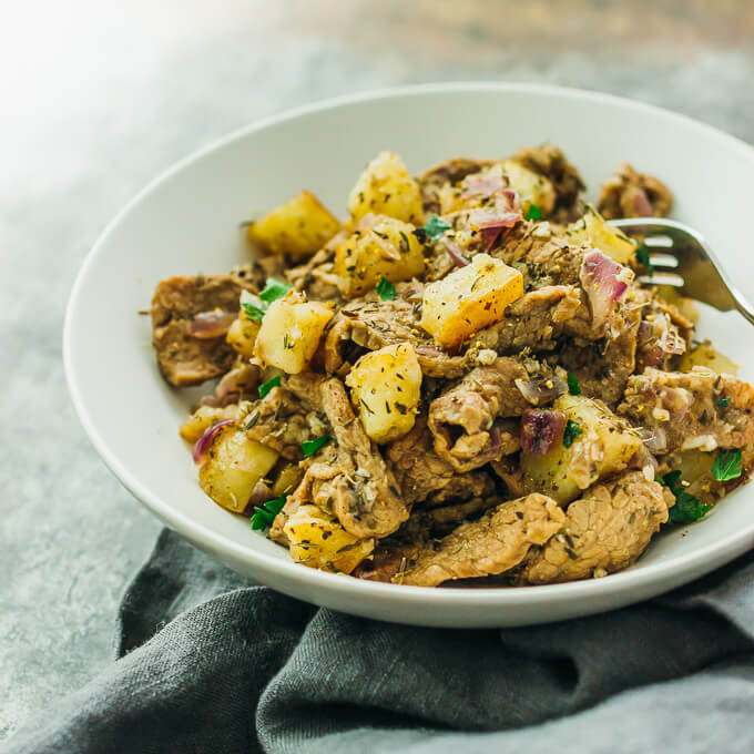 This skillet meal is an easy dinner with thinly sliced steak, cubed potatoes, and onions.