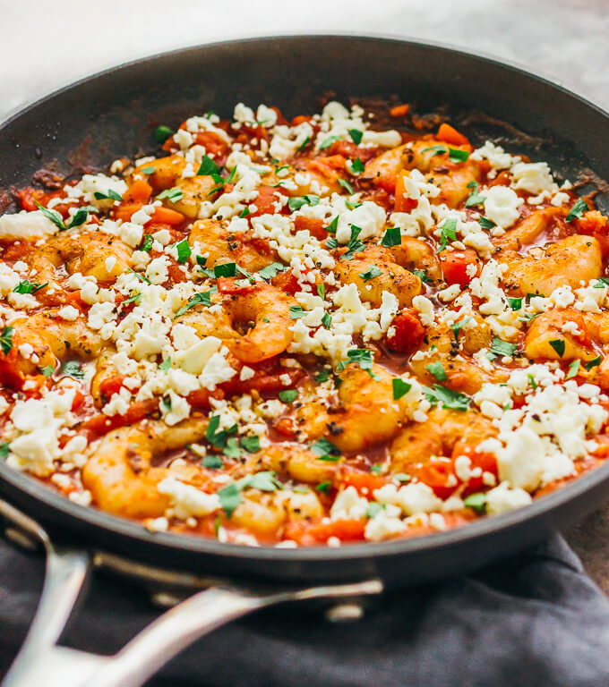 pan seared shrimp with tomatoes and feta in skillet