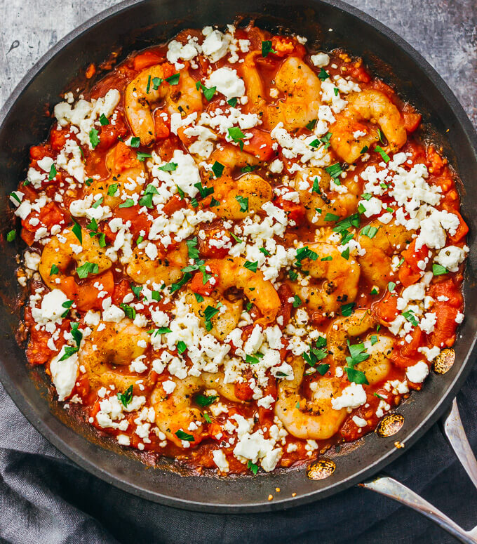 overhead view of shrimp with tomatoes and feta cheese