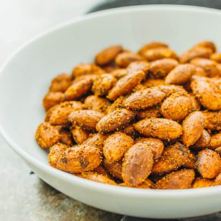 These savory spiced almonds have a spicy smoky garlic flavor, and are easily cooked in just 5 minutes on a pan. It's an easy vegan recipe that makes for a healthy and flavorful snack.