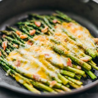 Here’s an easy side dish recipe: baked asparagus topped with melted cheese and bacon.