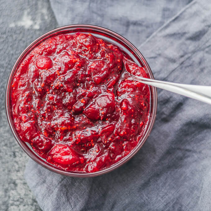 overhead view of cranberry sauce with spoon