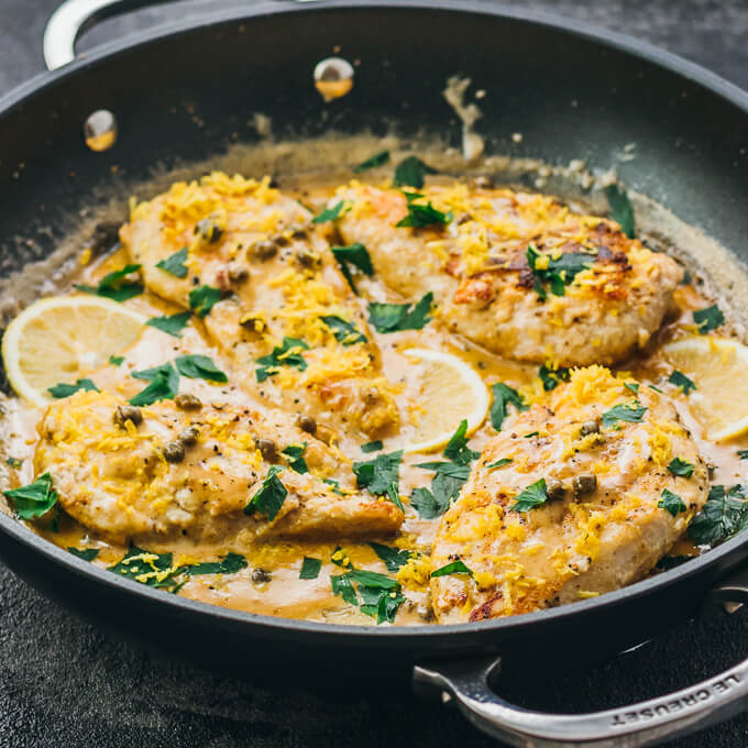 lemon chicken piccata in black pan