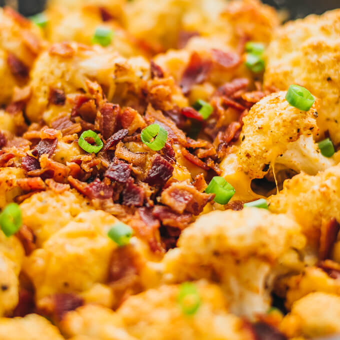 This easy roasted cauliflower is a super comforting low-carb meal, loaded with bacon and cheese.