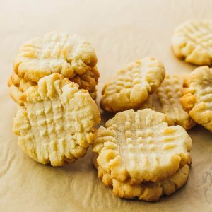 stacks of butter cookies on parchment paper