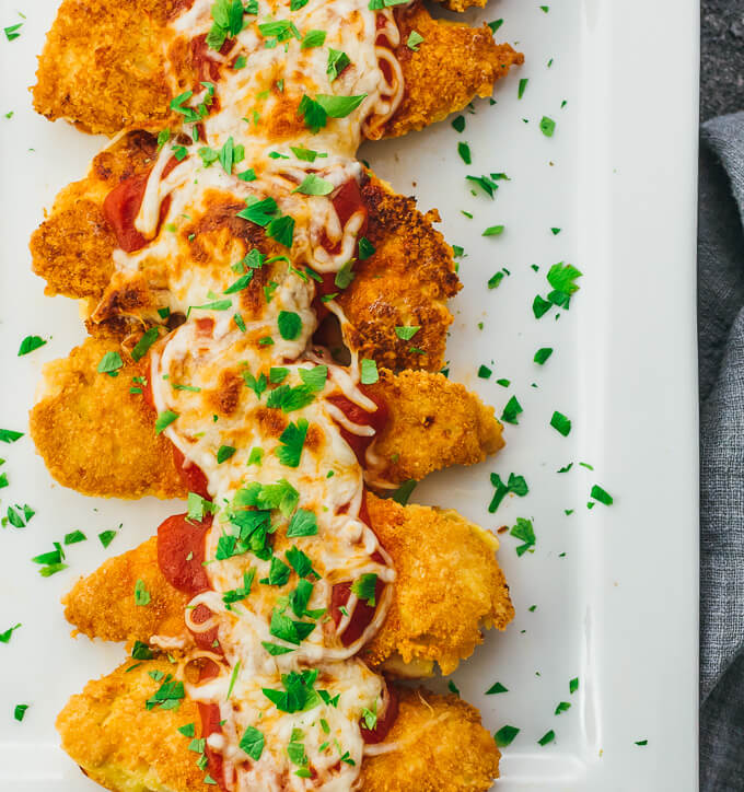 How to make the best chicken parmesan tenders recipe in a pan and using the stovetop and oven