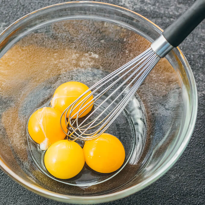 egg yolks in glass bowl