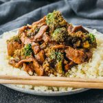 beef and broccoli served with riced cauliflower