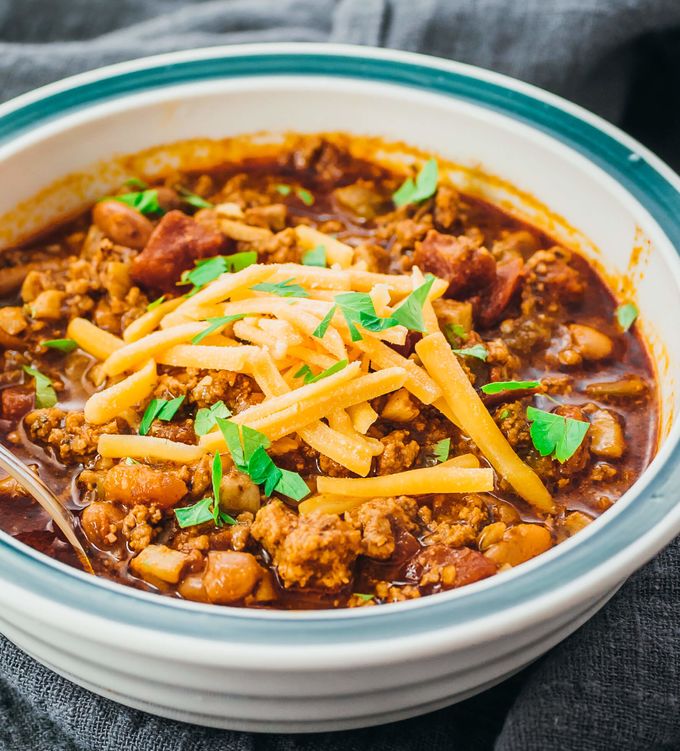 Low carb ground beef chili with beans served in a bowl and made in the instant pot pressure cooker