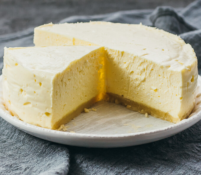 Low carb version of instant pot cheesecake served on a white plate