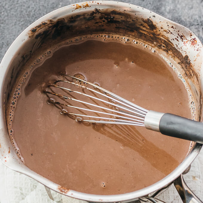 whisking hot chocolate mixture