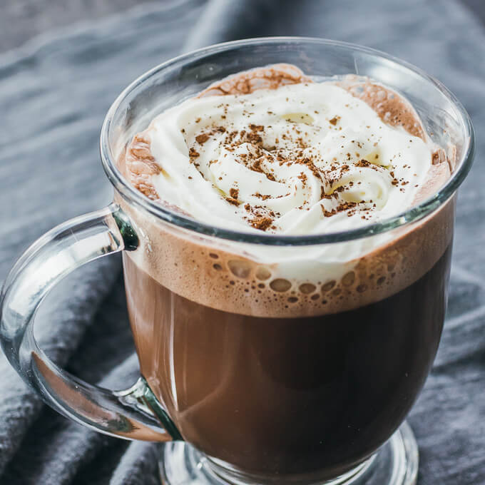 hot chocolate served in glass mug