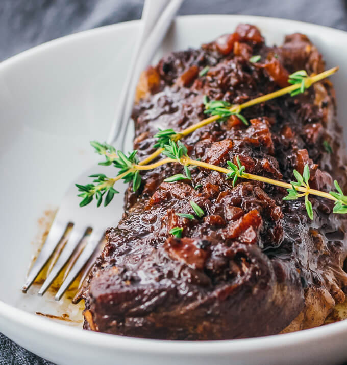 cooked short ribs served in white bowl