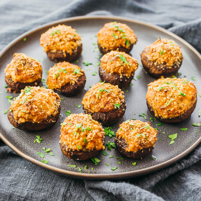 crab stuffed mushrooms served on plate