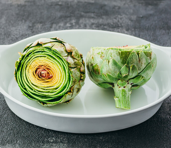 trimmed artichokes in white dish