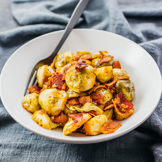 pressure cooked brussels sprouts in white bowl